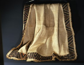A prestigious kaitaka cloak, of soft beaten flax fibres