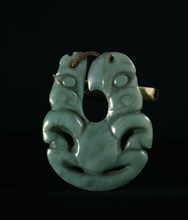 Hei matau (fish hook) pendant made of jade, given by a Ngapuhi Maori chief to a British captain in 1834