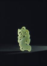 A small jade ornament depicting a taniwha or sea monster