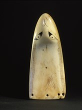 A rei puta, a type of whale ivory pendant commonly worn in the eighteenth century