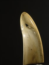 A rei puta, a type of whale ivory pendant commonly worn in the eighteenth century