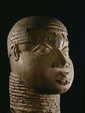 A terracotta head from the ancestral shrine of a leading member of the brass casting guild