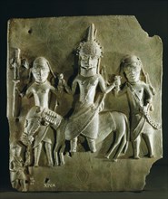 Benin brass plaque from the palace, depicting an Oba on horseback supported by two retainers