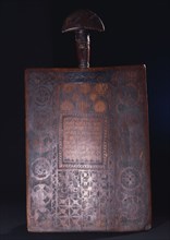 Unusually fine example of a Koran board, ornamented with abstract Islamic motifs and a text from the Koran