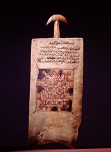 A wooden board from Hausa land with a sacred Arabic text from the Koran
