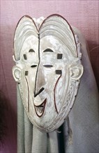Igbo Okoroshi mask, one of the messengers of the water deity Owu, who performs during the annual one month New Yam festival known as Oma