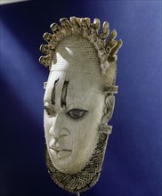 An ornamental mask which formed part of the regalia of the Benin king (Oba)