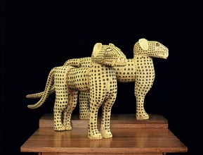 A pair of ivory leopards placed on either side of the Obas throne on state occasions