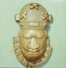 An ivory hip pendant worn as part of the ceremonial regalia of the Oba (Benin king)