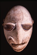 Unusual caricature Gelede mask with exaggerated features, used either in the daytime entertainment section of an Efe / Gelede performance, or as a satire on Gelede by an onidan Egungun masquerader