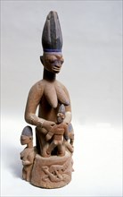 A shrine figure in the form of mother and child