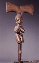 A staff used by devotees of Shango the Yoruba orisha of thunder and lightning, carried in dances when possessed by the deity