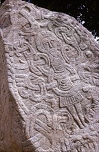 The Jelling stone was erected by King Harald Bluetooth, the first Christian king of Denmark, in memory of his parents