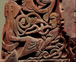 Detail of a carving from a stave church portal illustrating the story of Sigurd