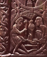 Stave church carving with a scene from the story of Sigurd