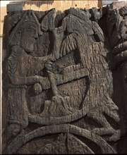 Detail of a carving from a stave church portal illustrating the story of Sigurd
