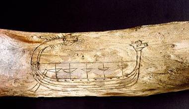 A Norse ship incised on a piece of wood