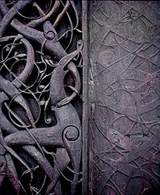 Detail of the carving on the side of the stave church at Urnes
