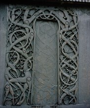 Carving on the side of the stave church at Urnes