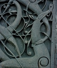 Detail of the carving on the side of the stave church at Urnes