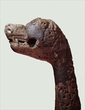 Carved dragon head post from the ship burial at Oseberg
