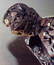 Monster head carving from one of thesledges found in the Oseberg Shipburial