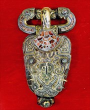 Brooch in the early Vendel style with cloisonne enamel work and precious stones