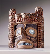 Tsimshian frontlets represent crest figures although the creature portrayed here may be more abstract than a literal interpretation would suggest