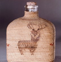 Jar with basketwork cover