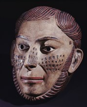 Mask of a red haired European sailor or trader