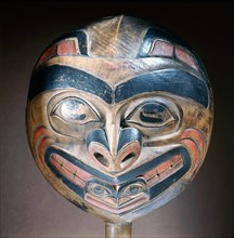A shamans rattle carved with the design of a killer whale