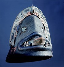 A defensive head piece made of wood and covered with leather