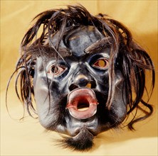 A mask representing Tsonoqa, a giantess who carried away children in order to eat them