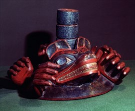 Wooden ceremonial hat with bears head and human hands