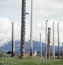 Totem poles at a Tsimshian village