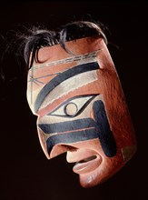 Wooden mask which stylistically appears to be Tsimshian but has also been attributed to the Nootka