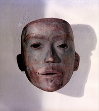 Mask in the form of a human face
