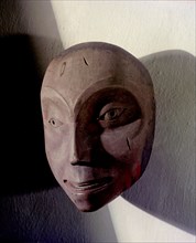 Shamans mask in the form of a human face