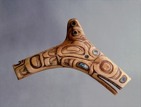 Shamans charm carved in relief and inlaid with abalone shell