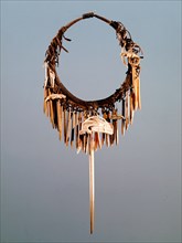 Part of a Haida shamans gear included a neckring from which various bone charms were suspended