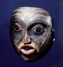 Mask carved to represent the spirit of an old wrinkled man