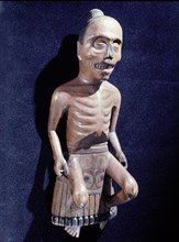 Carved figure of a medicine man