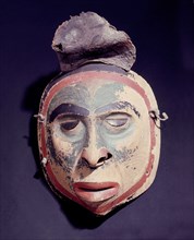 Part of a shamans kit, this mask portrays a dead man