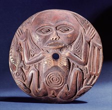 Spindle whorls were used by the Coast Salish during spinning to prevent the wool slipping from the spindle