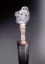 Copper and iron knife with arepresentation of the bear totem