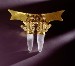 Double armed pendant made, unusually, from gold and rock crystal