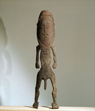 Two dimensional male figure incised on bark, from the Papuan Gulf area