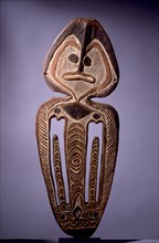 Painted two dimensional female figure incised on bark, from the Papuan Gulf area