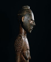 Carved female figure from the middle Sepik area, probably a depiction of a female clan ancestress from a mens meeting house