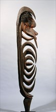 Stylised figure of spirit, known as Yipwon, that assists men with hunting and head hunting, kept in the mens house and hidden from women and uninitiated